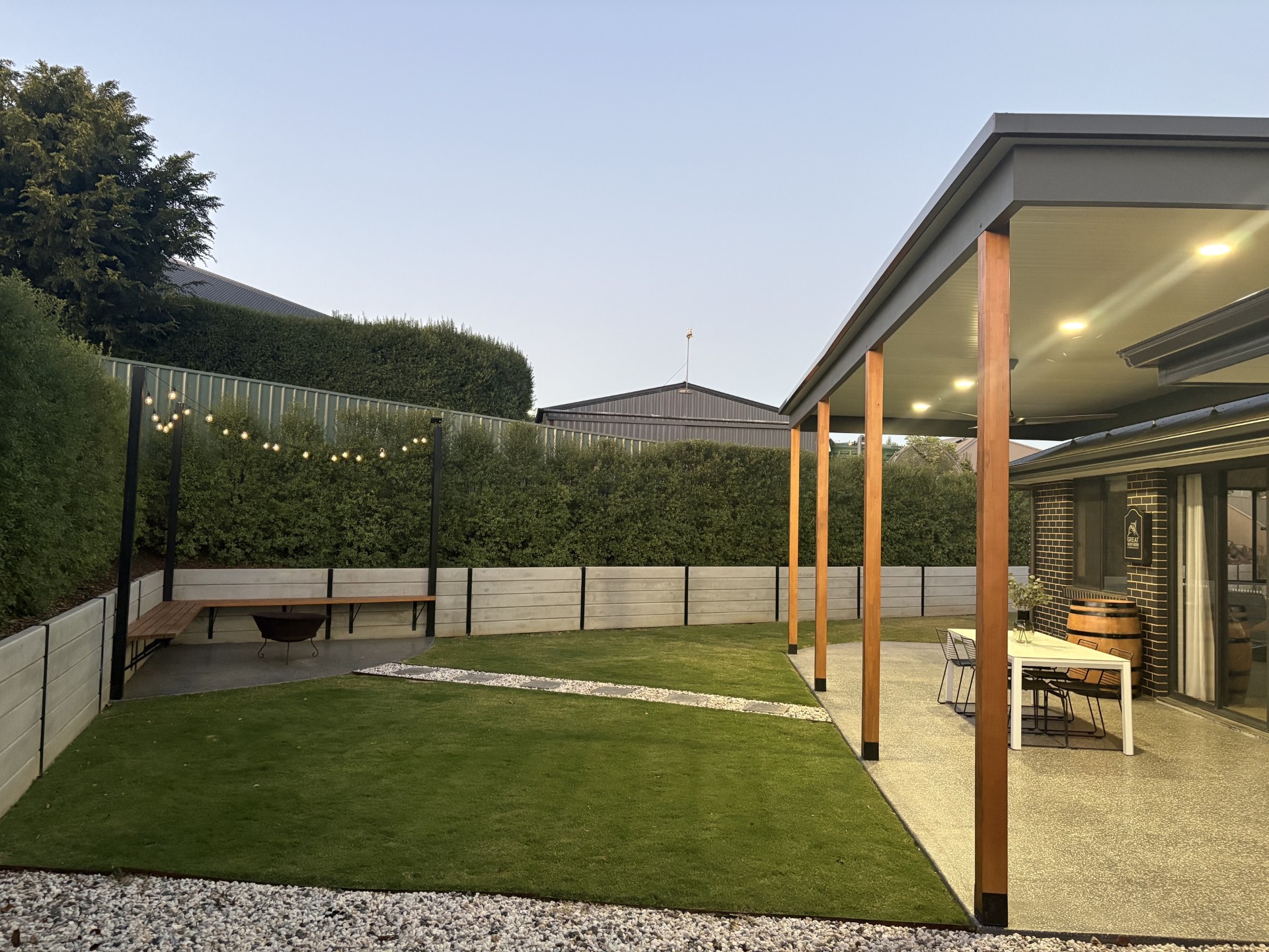 Backyard pergola, deck, and landscaping built by Wright Built Constructions